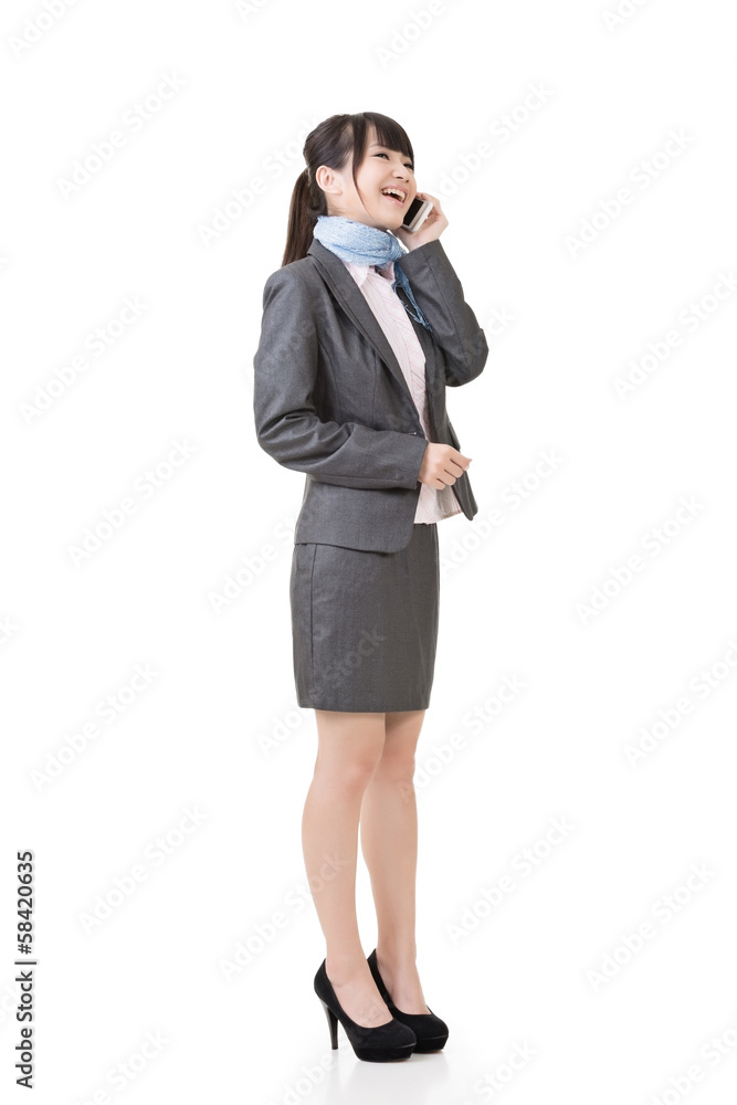 Asian business woman talking on cell phone