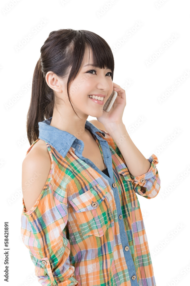 Young pretty asian woman talking by mobile phone Young pretty asian woman talking by mobile phone