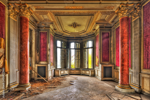 Empty majestic room in an abandoned manor photo