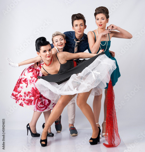 Stylish women and man in a vintage suits