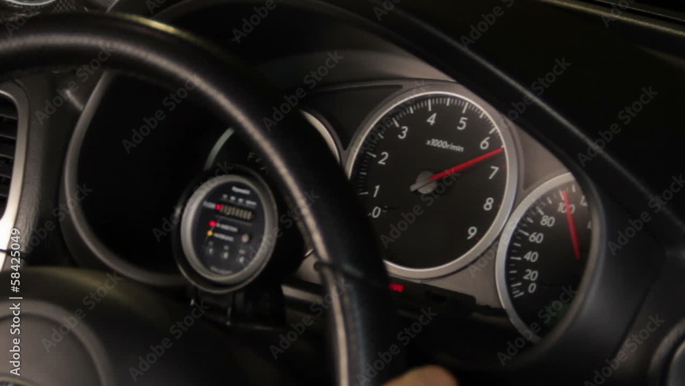 Car speedometer revving red line Car speedometer revving red line