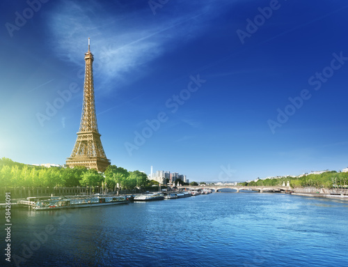 Seine in Paris with Eiffel tower in sunrise time