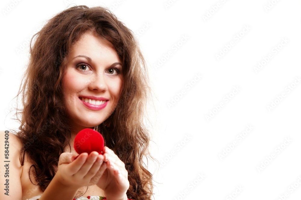 woman holding a present with engagement ring woman holding a present with engagement ring