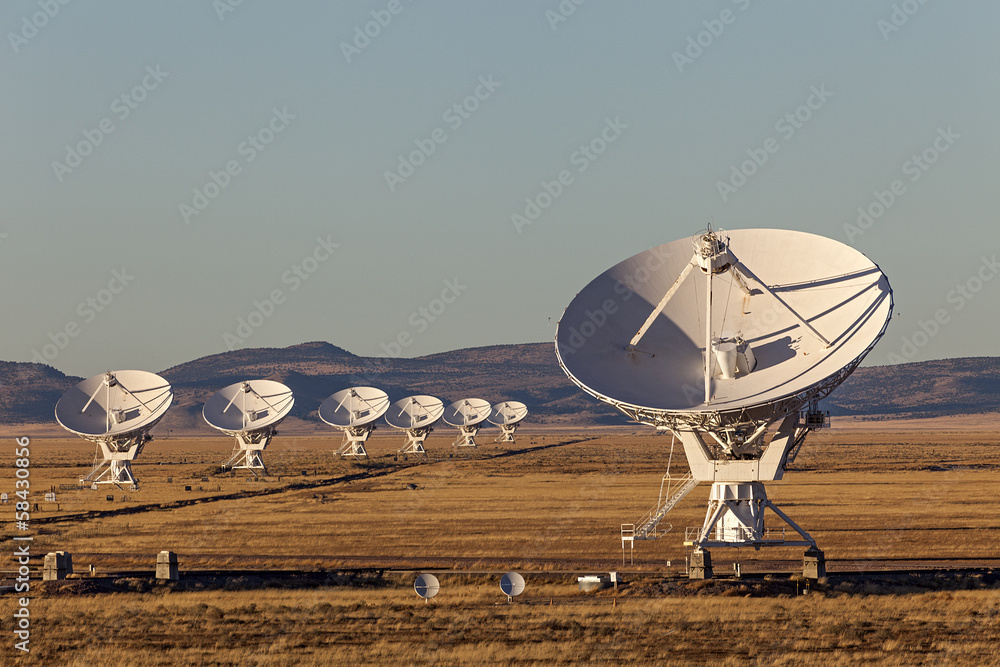 Very Large Array satellite dishes at Sunset in New Mexico, USA