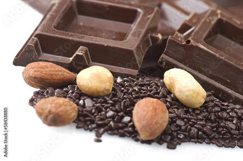 Closeup detail of chocolate parts on white background.