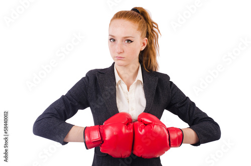 Woman businesswoman with boxing gloves on white