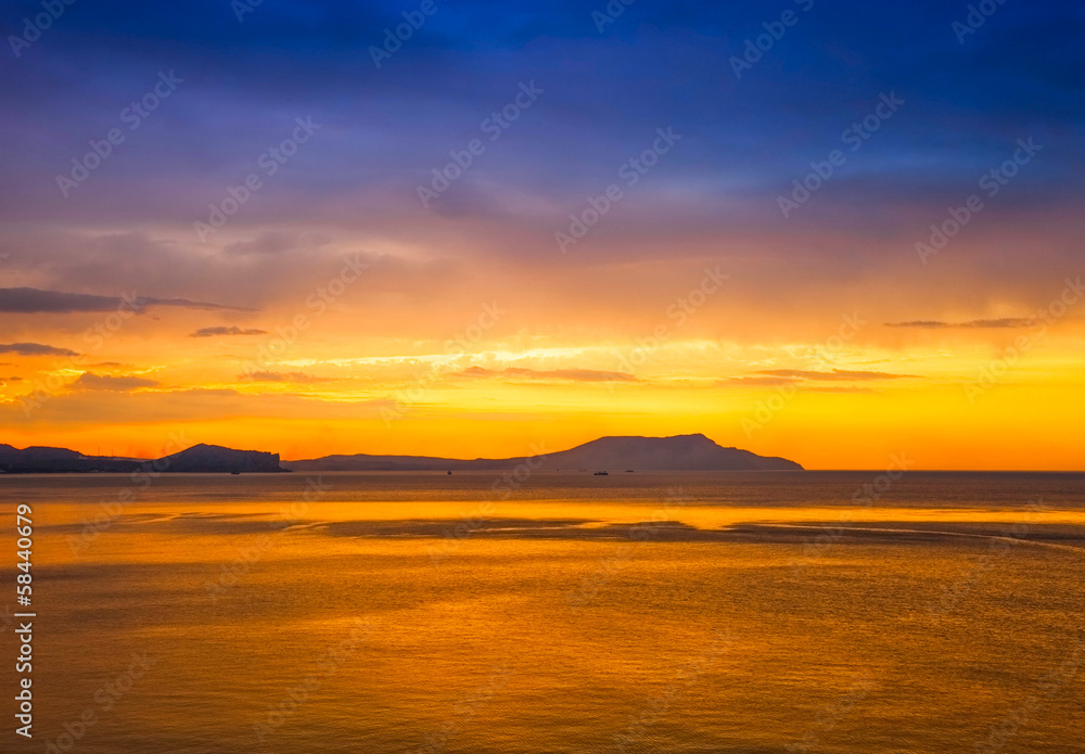 golden sunset on the sea and mountain view golden sunset on the sea and mountain view