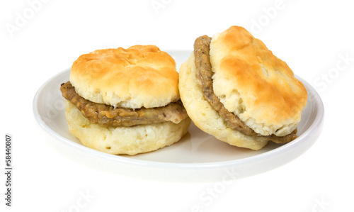 Two small breakfast sandwiches on a plate