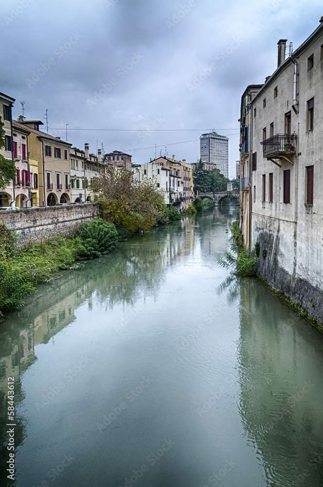 Traditional Italian Buildings by a River