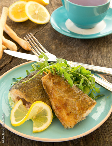 Fried fish with salad.