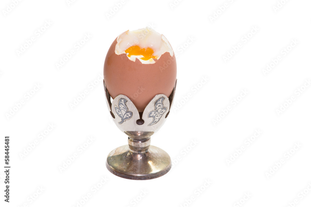 Boiled egg on egg cup isolated Boiled egg on egg cup isolated