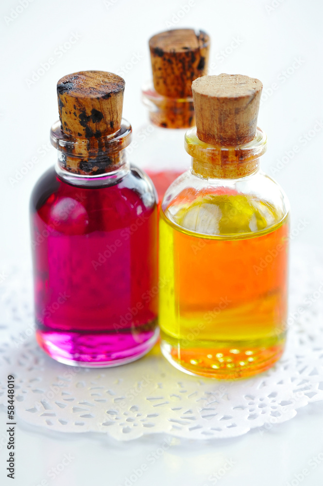 Bottles with basics oils on white