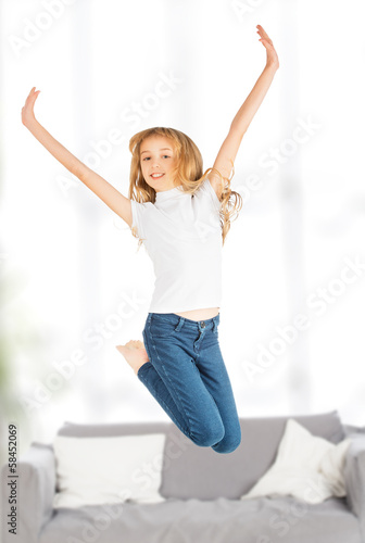 happy child girl jumping
