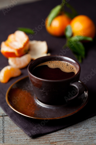 Fototapeta Naklejka Na Ścianę i Meble -  Cup of coffie and clementines