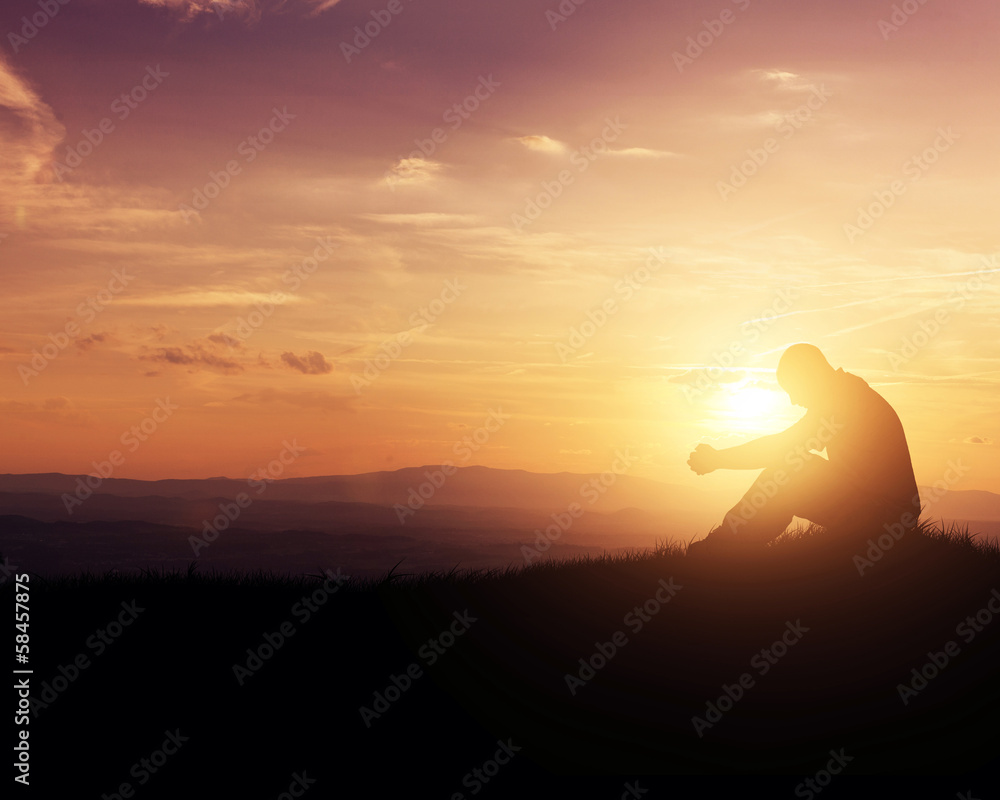 Praying at sunrise - obrazy, fototapety, plakaty 