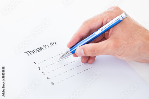 Hand filling things to do list