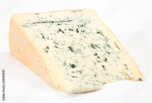 Wedge of full fat soft blue cheese