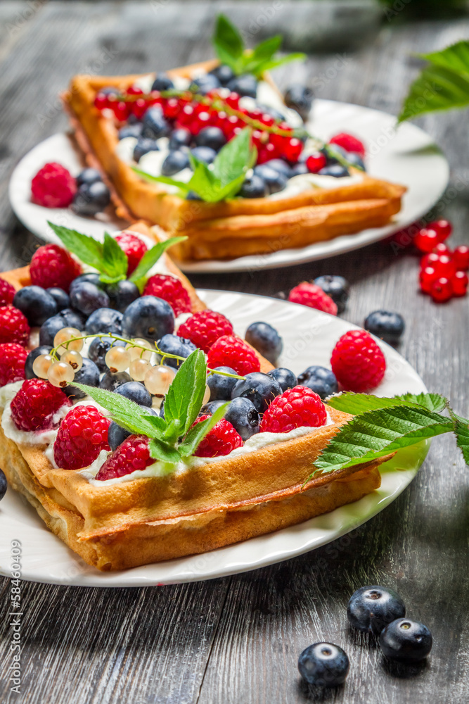 Waffels with cream and blueberry and raspberry Waffels with cream and blueberry and raspberry