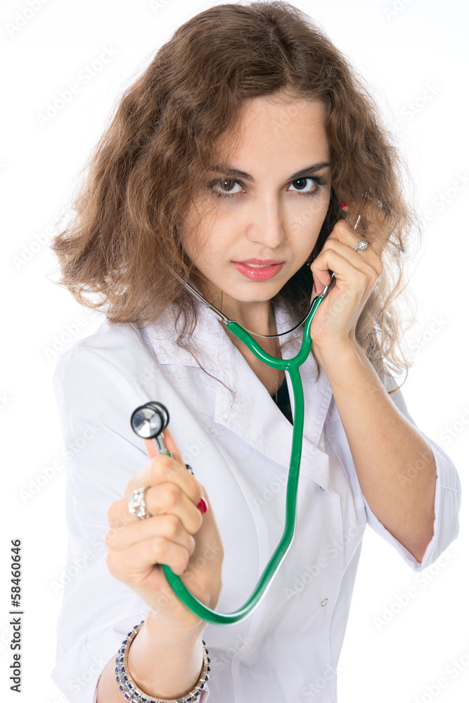 Portrait of a young doctor with a stethoscope. Portrait of a young doctor with a stethoscope.