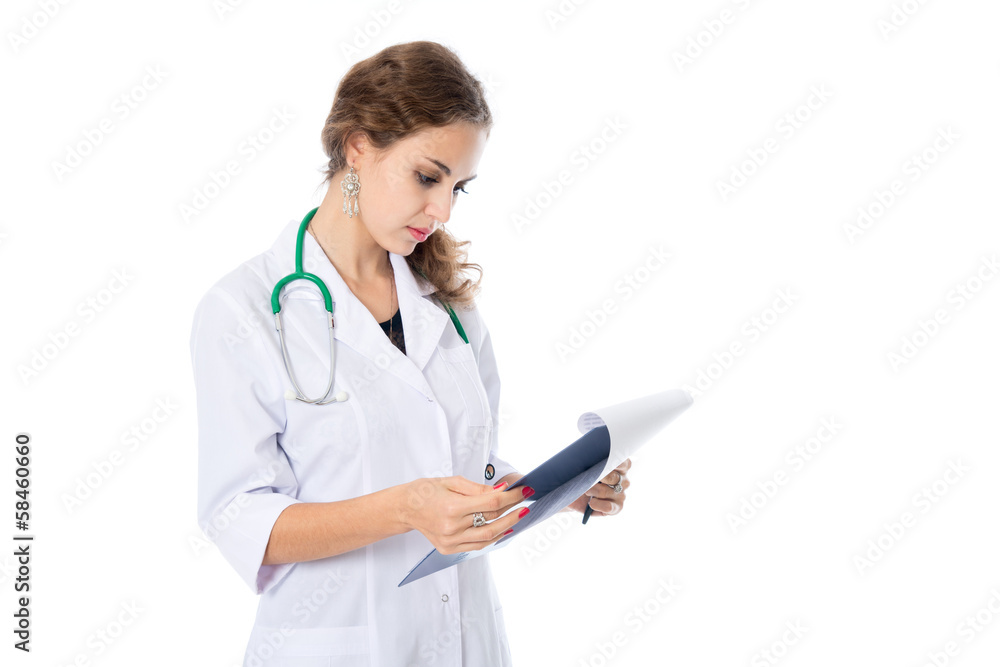 The young doctor is studying the paper, prescriptions The young doctor is studying the paper, prescriptions