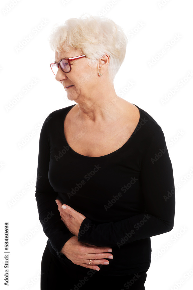 An old lady is having a stomachache. An old lady is having a stomachache.