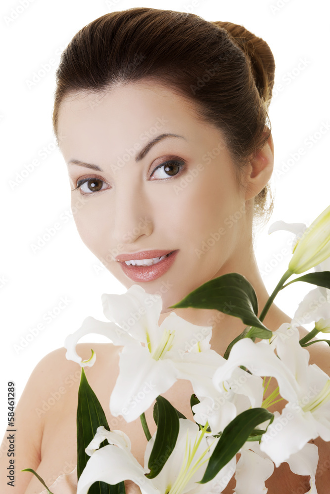 Portrait of beautiful adult woman with health skin and with lily Portrait of beautiful adult woman with health skin and with lily