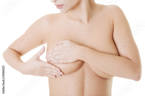 Female's body- examining breasts.