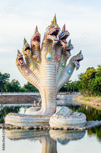 Beautiful Naga statue in lake photo