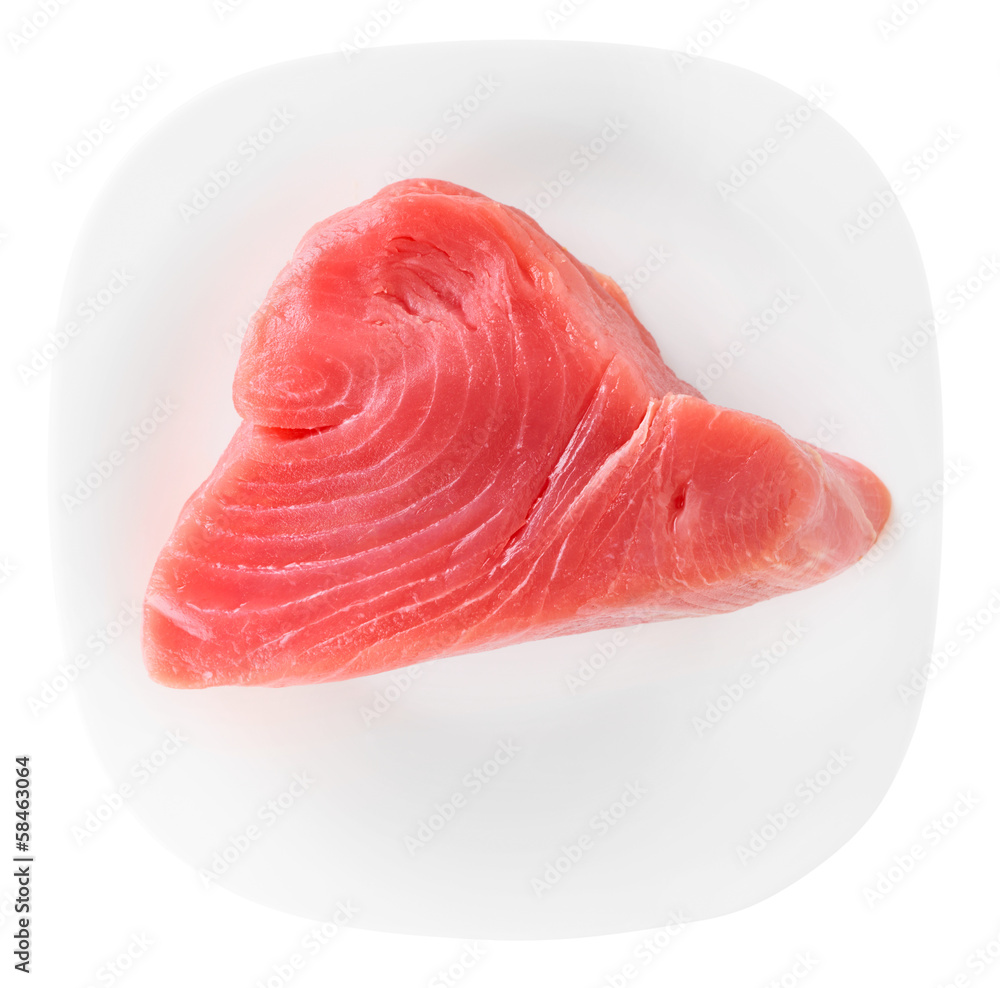 Tuna fillet on plate, isolated on white