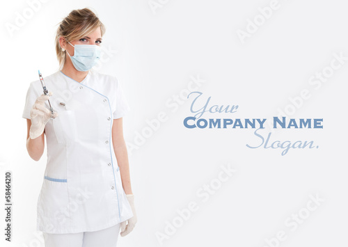 Dentist holding a syringe
