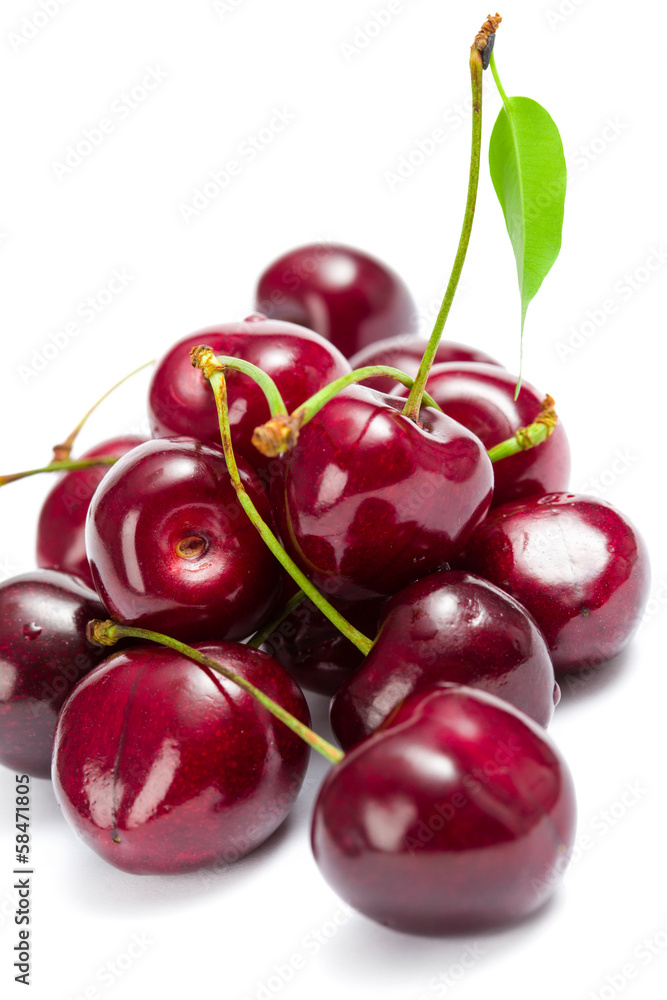 Close up of heap of cherry, isolated on white background Close up of heap of cherry, isolated on white background
