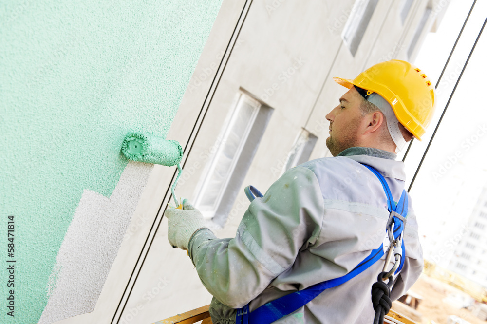 builder facade painter at work builder facade painter at work