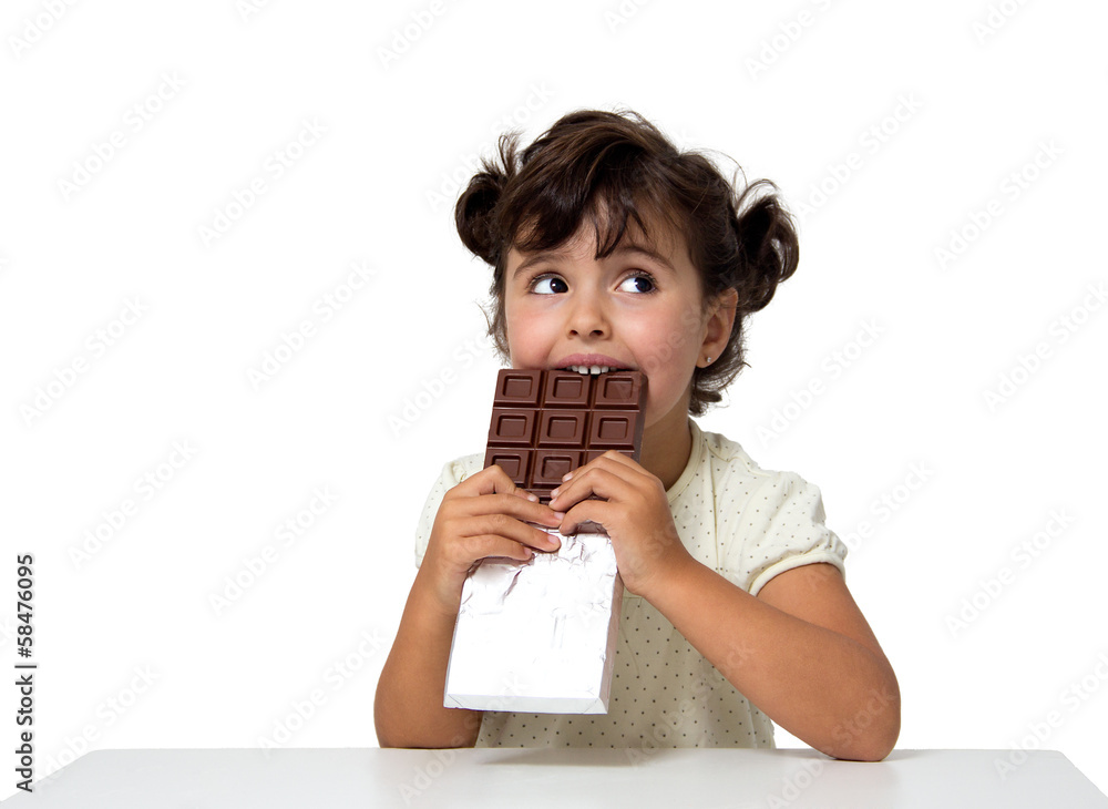 child eating chocolate