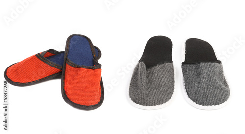 Foto Pair of red and gray slippers.