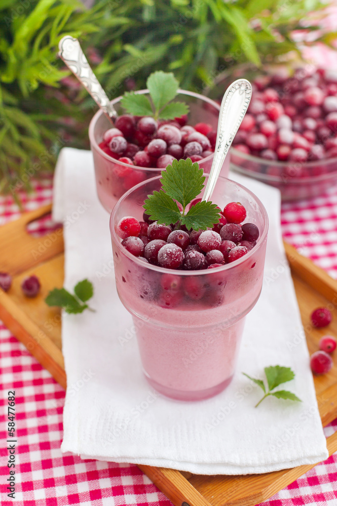 Two glasses of cranberry dessert on the tray Two glasses of cranberry dessert on the tray