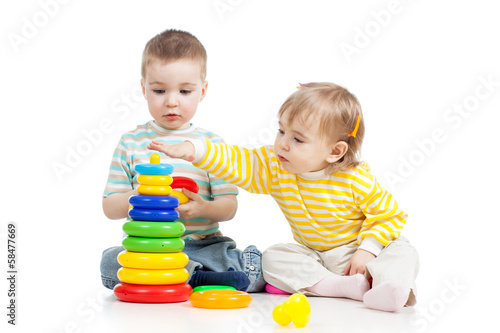 children girls playing toys together