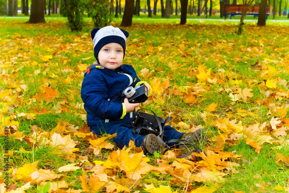 Funny child with a camera Funny child with a camera