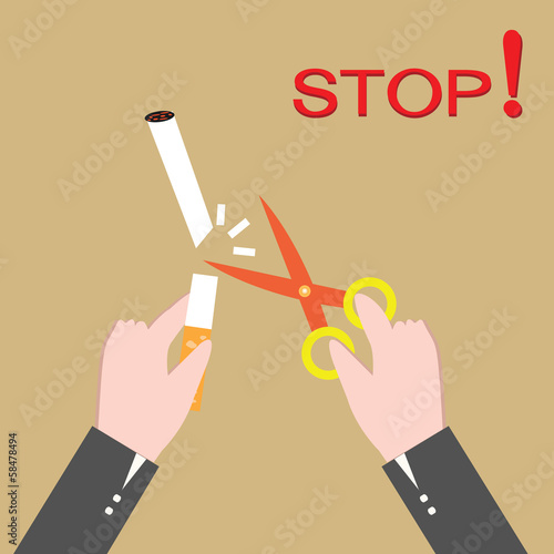 Stop smoking, human hands cutting the cigarette