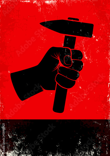 hand holding a hammer
