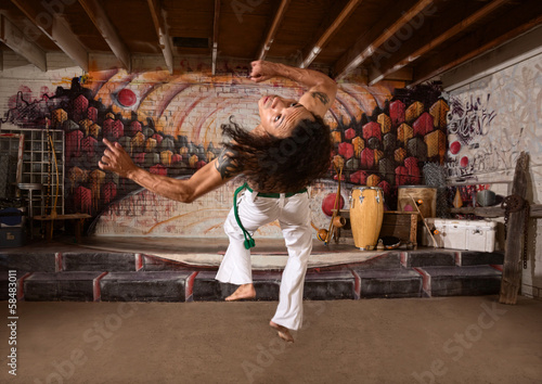 Capoeira Performer Leaping Up