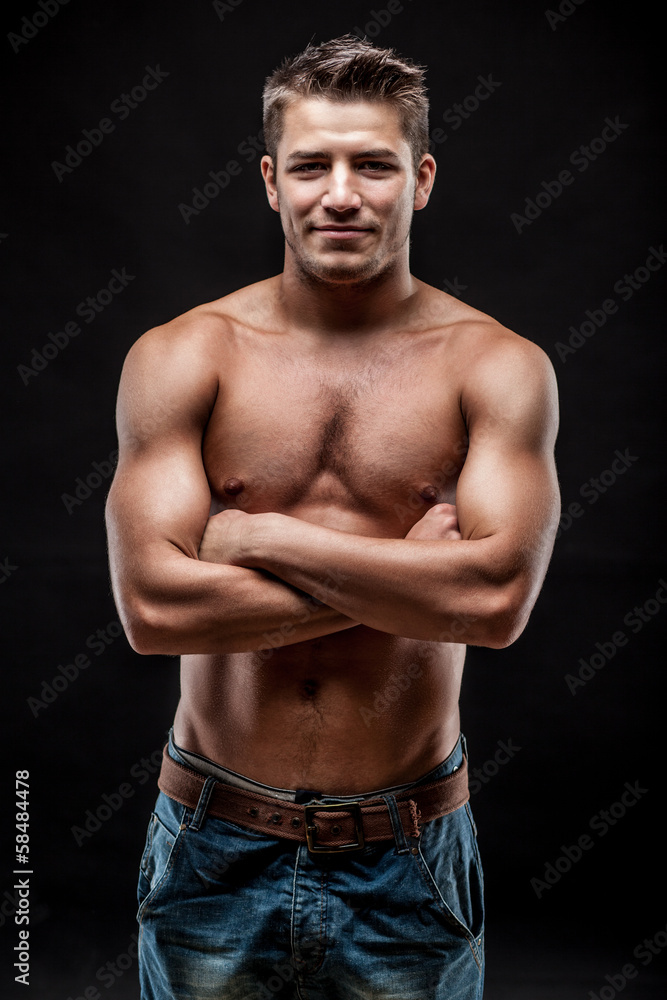 Fototapeta premium young man on dark background