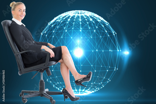 Composite image of businesswoman sitting on swivel chair in blac