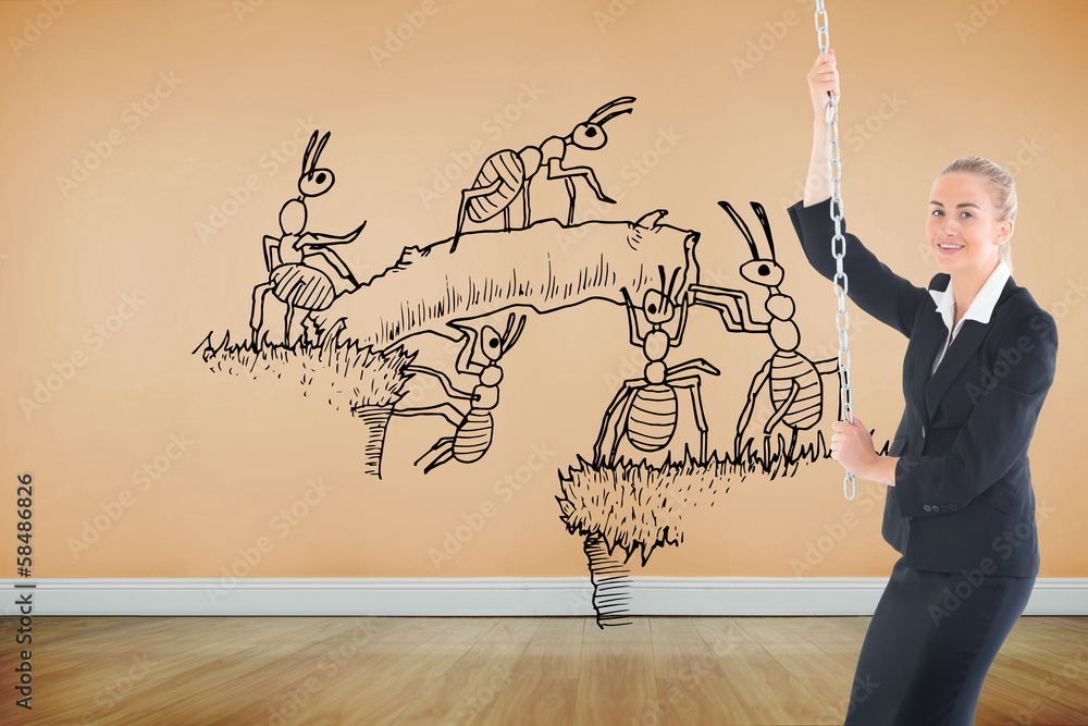 Composite image of businesswoman pulling a chain Composite image of businesswoman pulling a chain