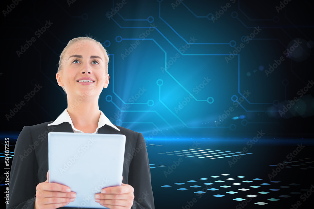 Composite image of businesswoman holding tablet Composite image of businesswoman holding tablet