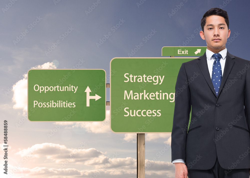 Composite image of stern businessman looking at camera Composite image of stern businessman looking at camera