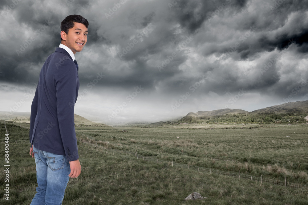 Composite image of smiling casual businessman walking