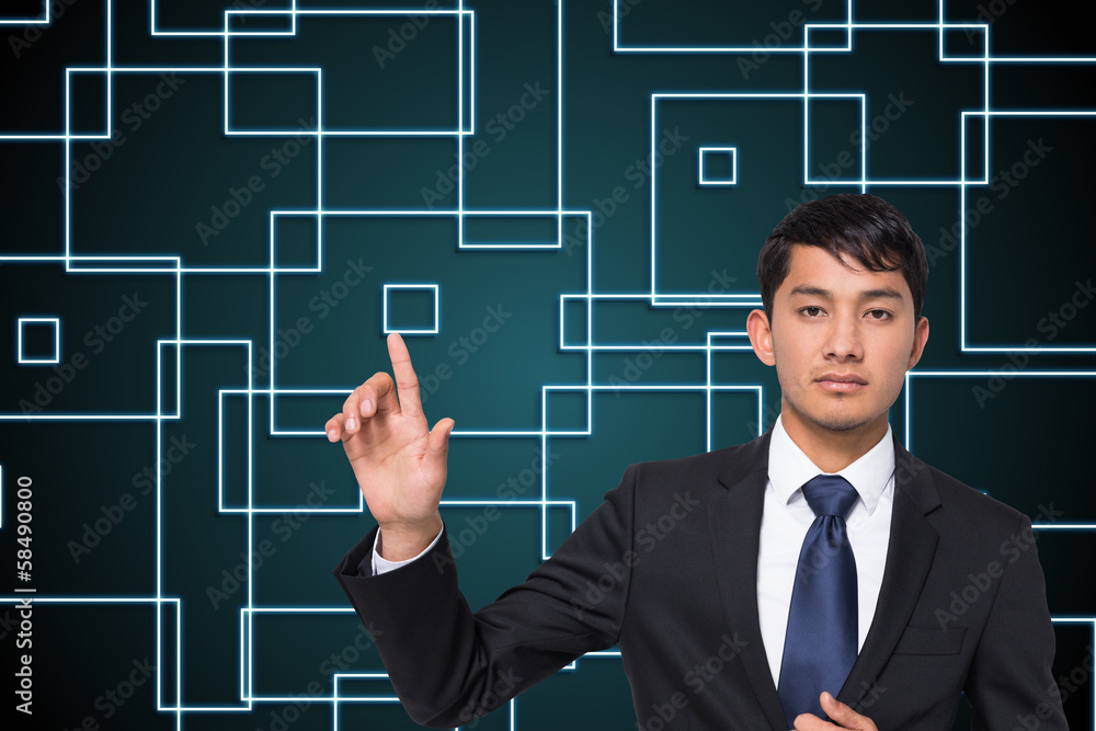 Composite image of unsmiling businessman touching Composite image of unsmiling businessman touching