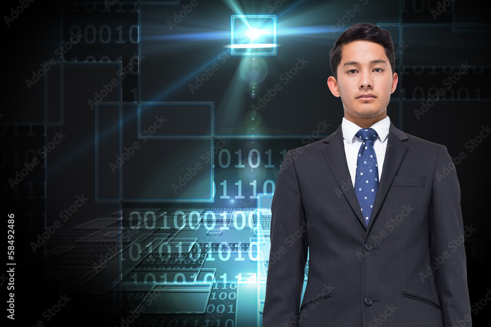 Composite image of stern businessman looking at camera Composite image of stern businessman looking at camera