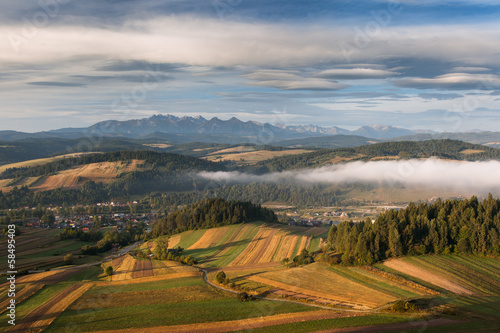 Fototapeta Naklejka Na Ścianę i Meble -  Hills in southern Poland, with Tatra Mountains on horizon