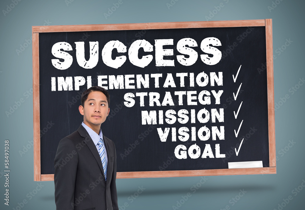 Composite image of serious asian businessman Composite image of serious asian businessman